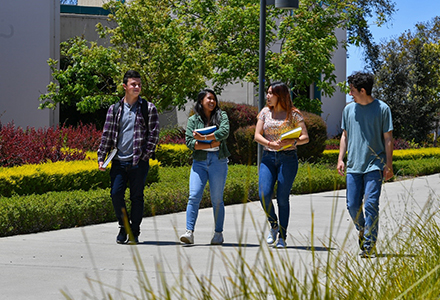 Students walking together on campus.